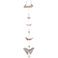 Decorative hanging mobile with butterfly shapes on a plain background