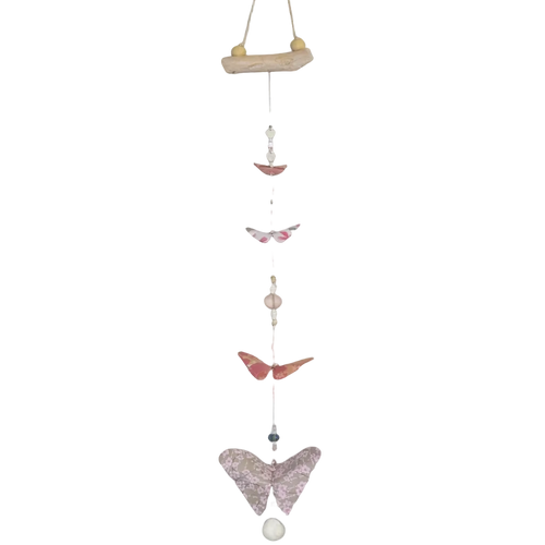 Decorative hanging mobile with butterfly shapes on a plain background